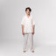NESHOW white Bambula cotton trousers with drawstring waist and wide leg, perfect for warm weather.