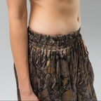 Woman wearing Camouflage pants zoomed at the waist
