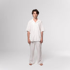 NESHOW white Bambula cotton camp shirt with short sleeves and a relaxed fit. Breathable and lightweight for comfort.