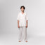 NESHOW white Bambula cotton camp shirt with short sleeves and a relaxed fit. Breathable and lightweight for comfort.