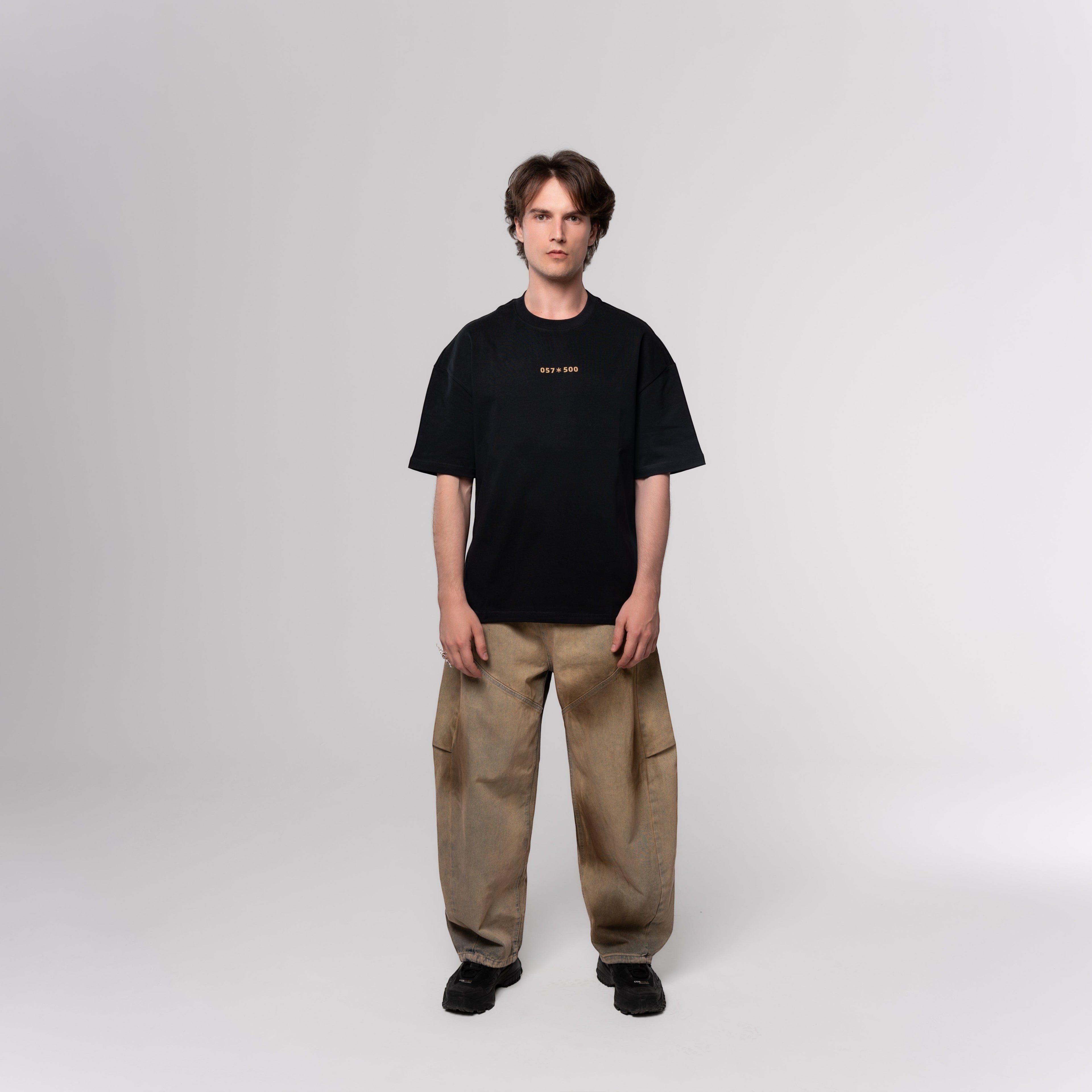 NESHOW black oversized t-shirt made from 320 gsm sustainable cotton with a unique random number print on the front.