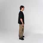 NESHOW black oversized t-shirt made from 320 gsm sustainable cotton with unique random number print.