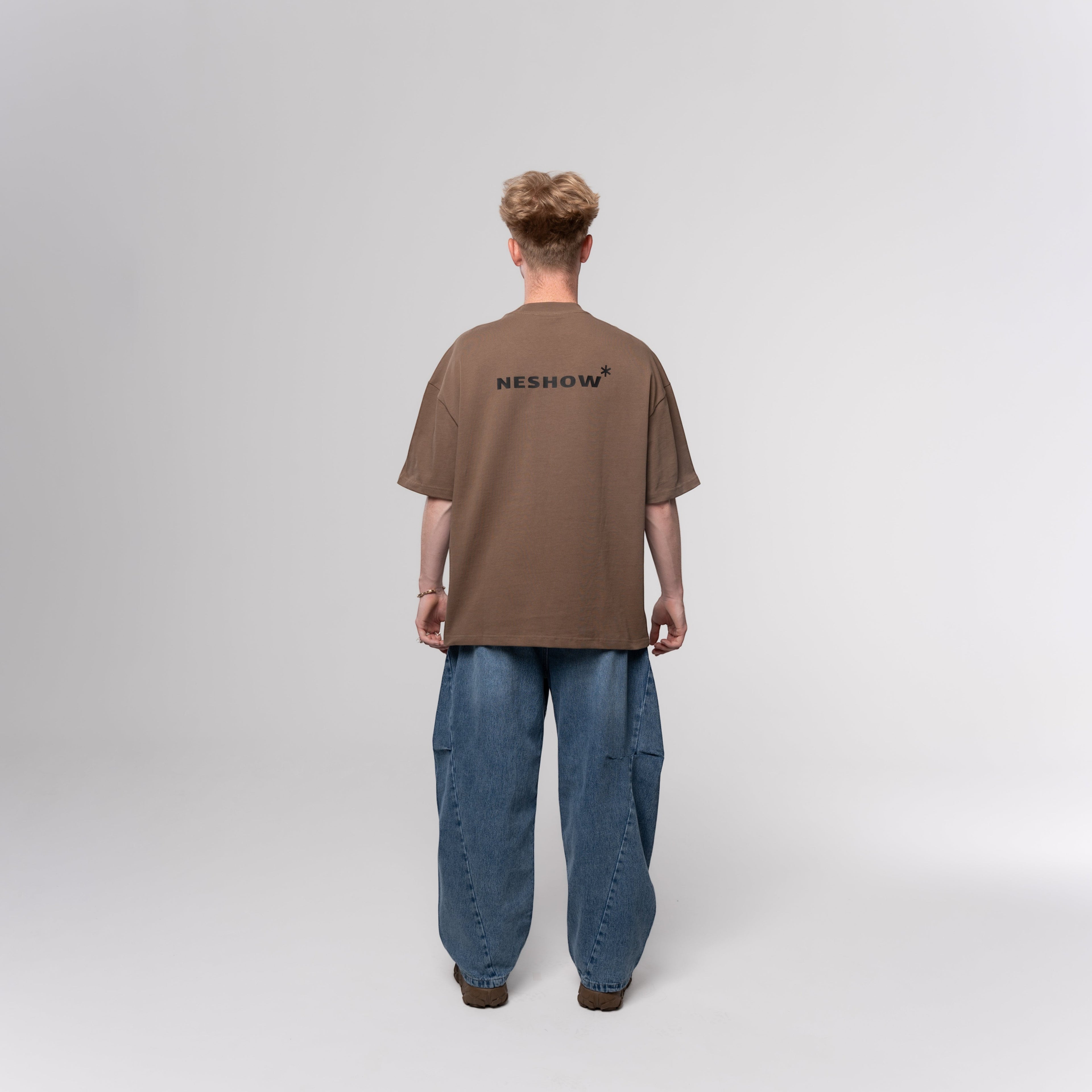 NESHOW brown oversized 320 gsm sustainable cotton t-shirt with black logo on back.