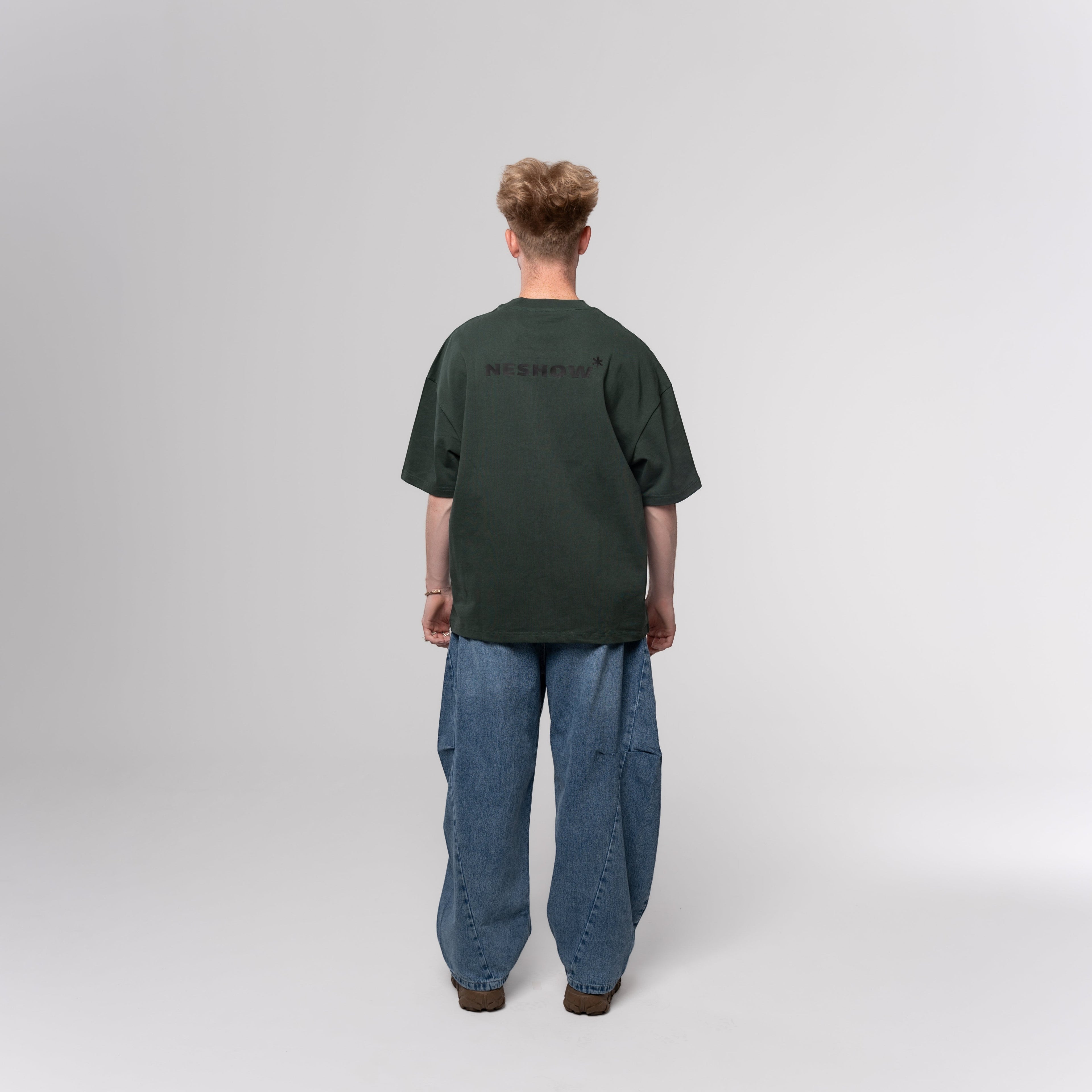 NESHOW dark green oversized 320 gsm sustainable cotton t-shirt with black logo on back.