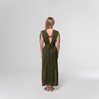 NESHOW olive green textured maxi dress with tie waist and open back, perfect for summer.