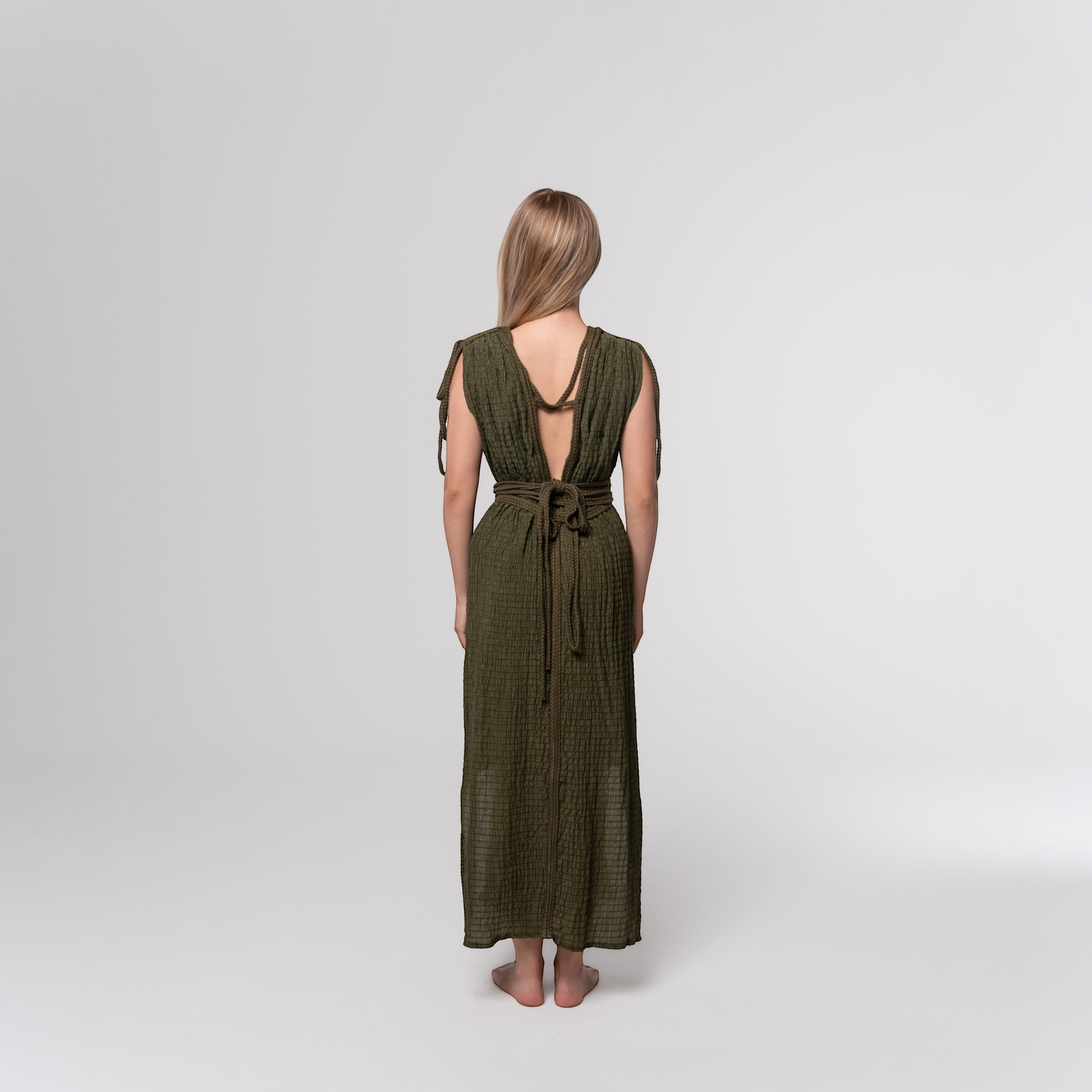 NESHOW olive green textured maxi dress with tie waist and open back, perfect for summer.
