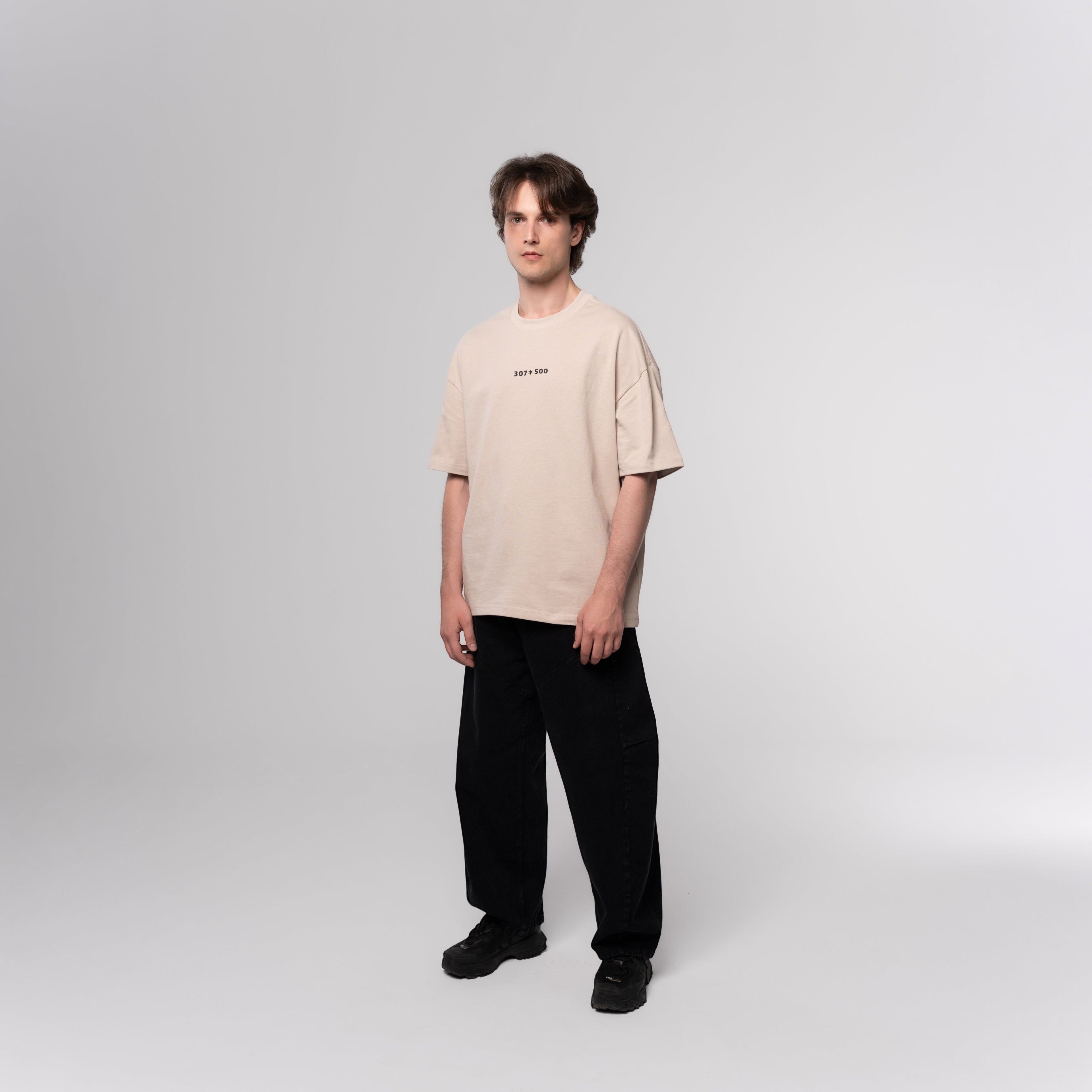 NESHOW oversized beige cotton t-shirt with random number print on front and logo on back. Limited edition.