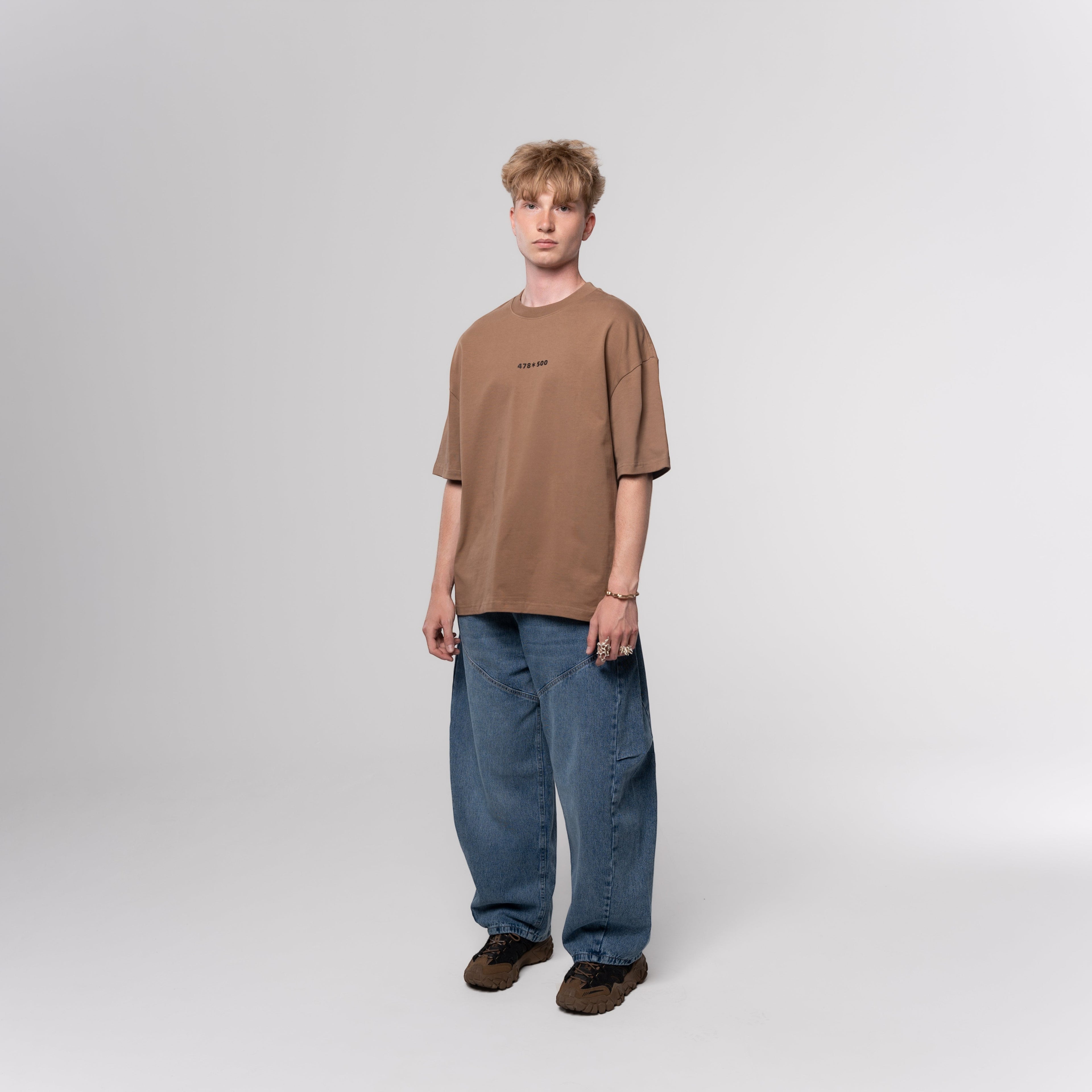 NESHOW oversized brown 320gsm sustainable cotton t-shirt with random number print on front and logo on back.