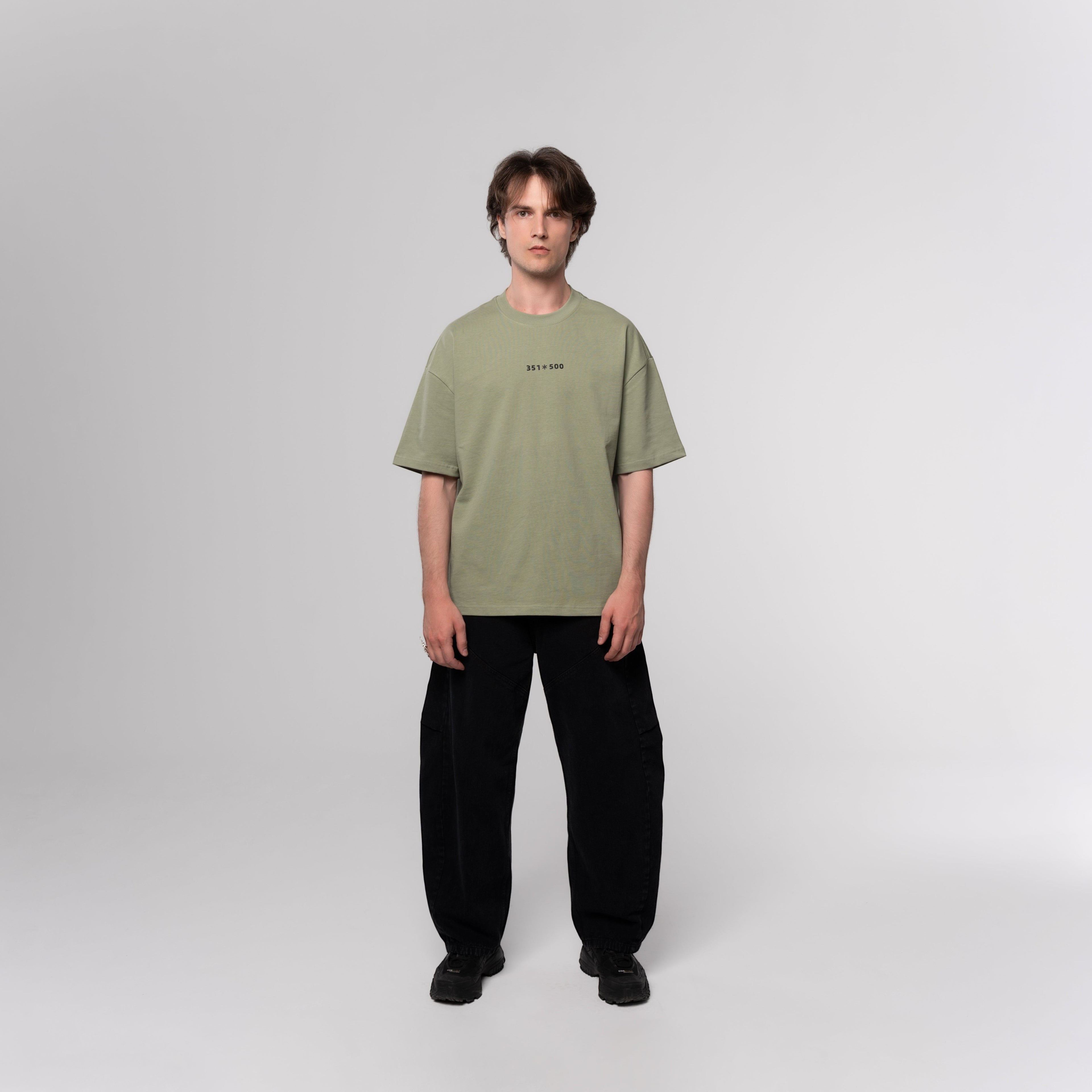 NESHOW oversized sage green cotton t-shirt with random number print on front and logo on back.
